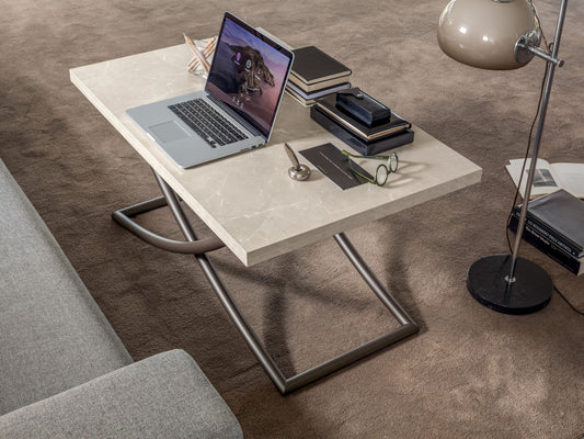 Altacom Sakura height adjustable table used as workspace with laptop and ceramic top