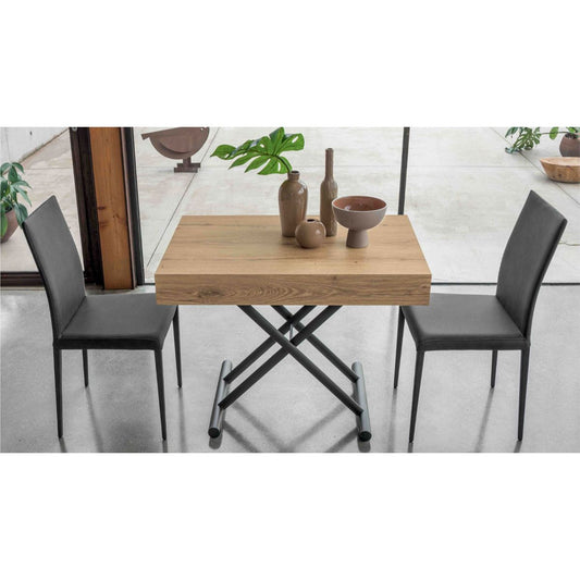 Compact convertible table by Altacom in small dining configuration for two people showing space saving design