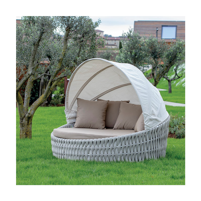 Grattoni Eden round outdoor daybed with white canopy, woven rope base and waterproof cushions, luxury garden lounge furniture