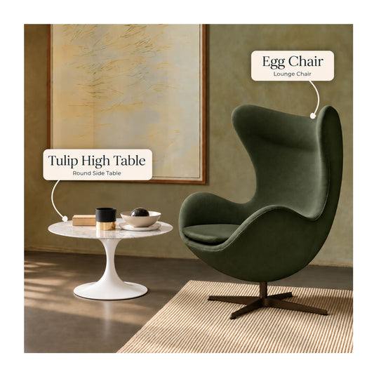 Green Egg lounge chair paired with a white marble Tulip side table featuring a round marble top and white pedestal base in a modern living room.