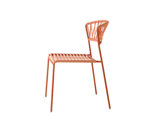 Side view of the Lisa Filò chair with a terracotta woven rope seat and backrest on a slim matching metal frame.