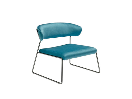 Front angled view of the Lisa Lounge designer armchair with blue upholstered seat, curved backrest, and chrome sled base.