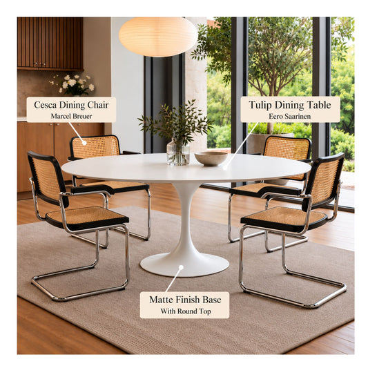 White round Eero Saarinen Tulip dining table with a white matte pedestal base paired with four Marcel Breuer Cesca armchairs featuring black wood frames, natural cane seats and backs, and chrome cantilever frames in a contemporary dining room.