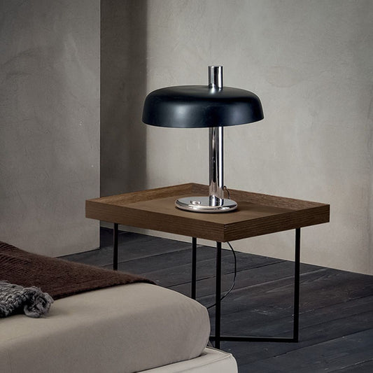 Coffee table made of metal and veneered wood