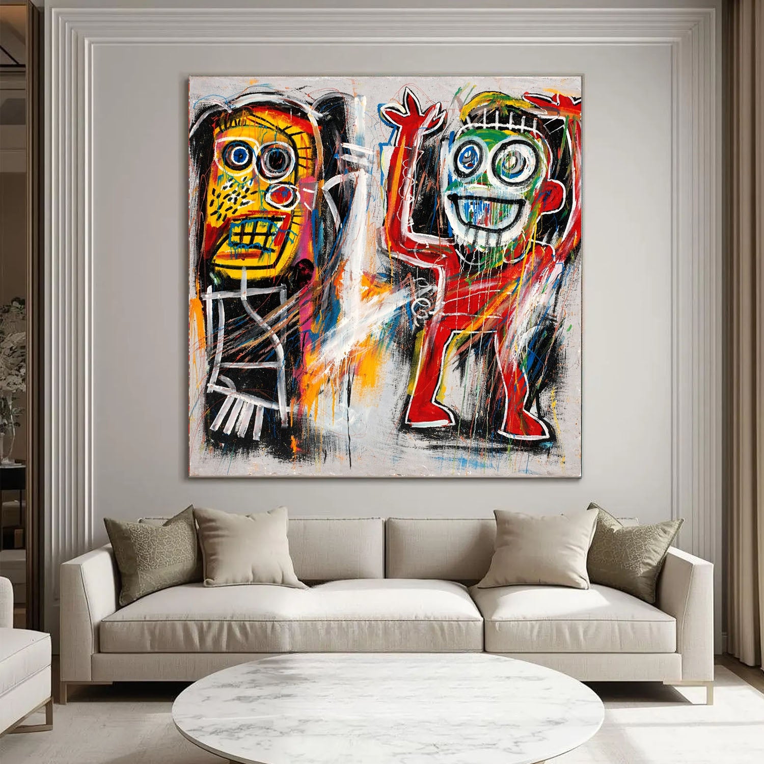 Colorful abstract painting of two figures on a wall above a beige sofa in a living room.