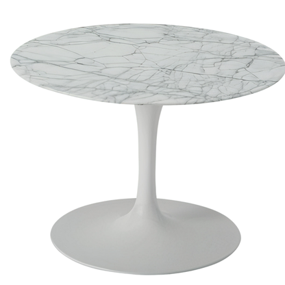 Round marble table with a white base on a white background