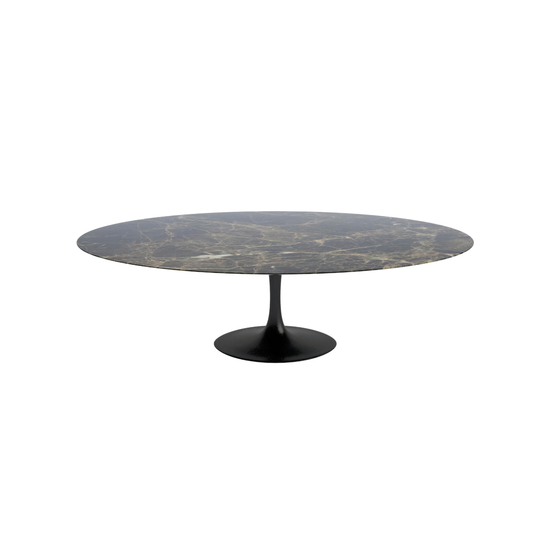 Round marble tulip dining table with a black base on a white background
