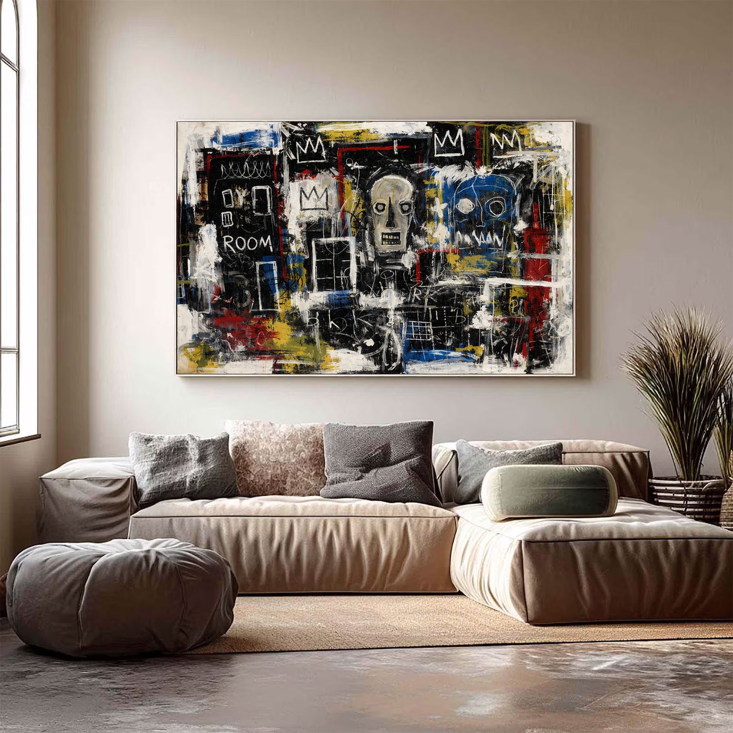 Abstract painting on a wall above a beige sofa in a living room.