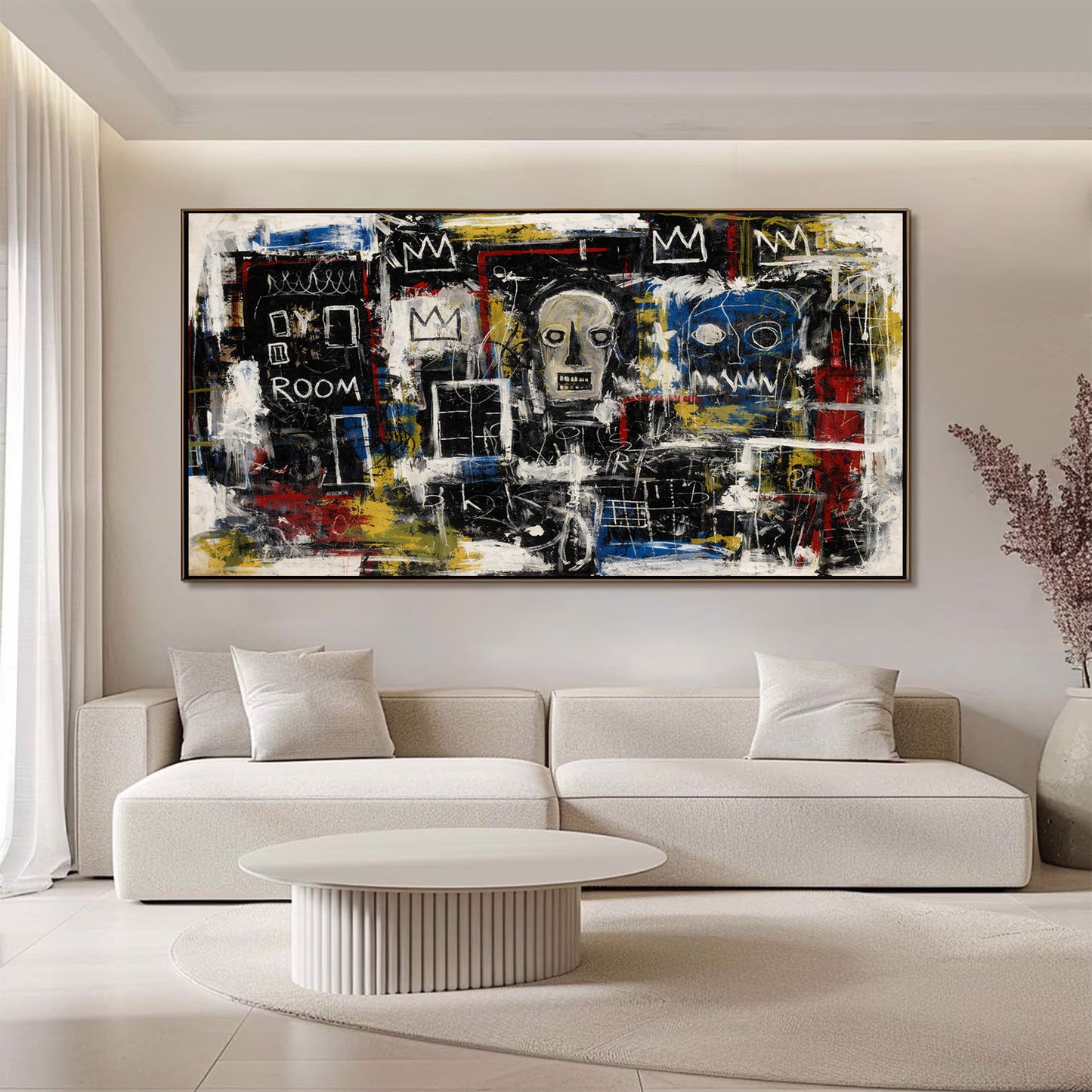Abstract painting on a wall above a white sofa in a modern living room.