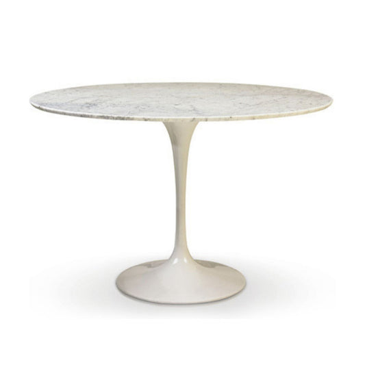 Round marble table with a white base on a white background