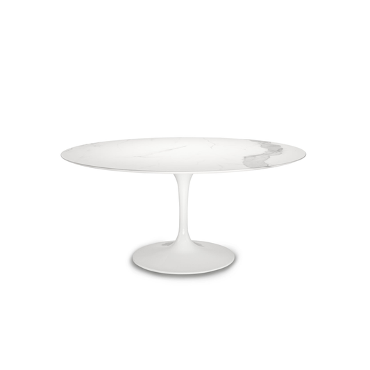White round tulip dining table with a pedestal base on a white background