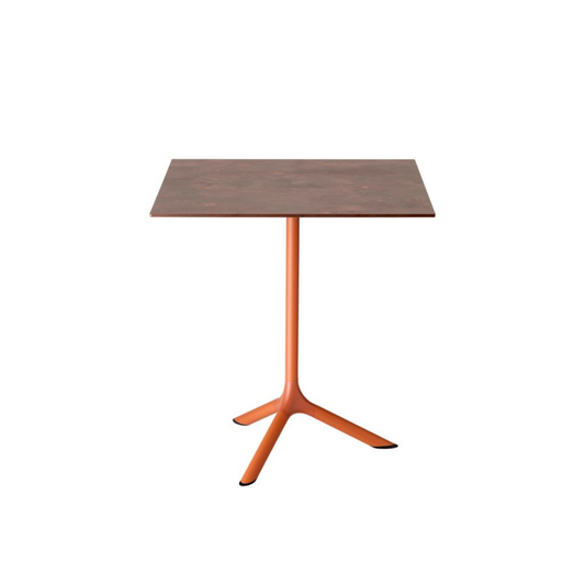 SCAB Tripè square outdoor dining table with a compact laminate tabletop and terracotta powder-coated aluminium tripod base, suitable for restaurants, cafés, hotel terraces and residential patios.