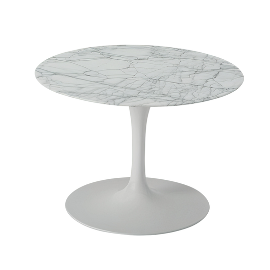 Round marble tulip table with a white base on a white background
