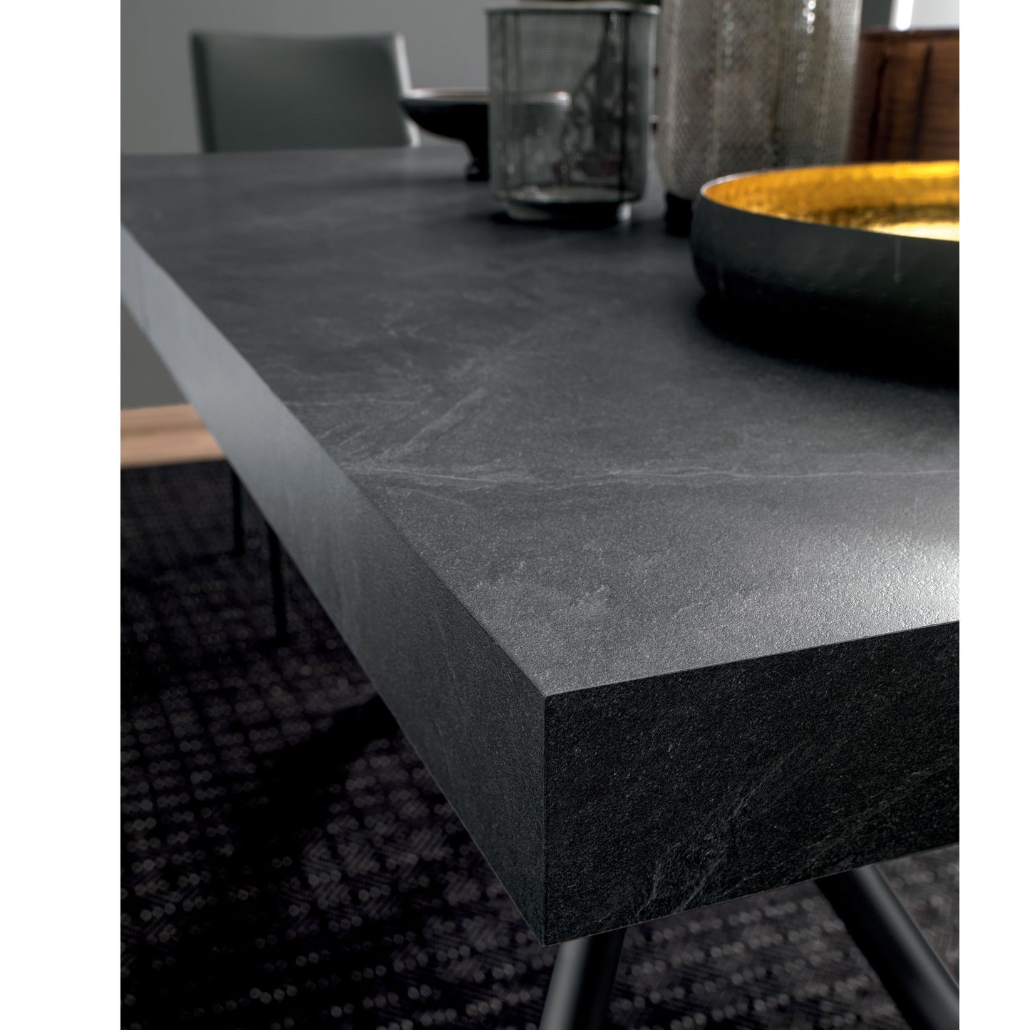 Close-up of ceramic top dining table showing thickness and premium finish