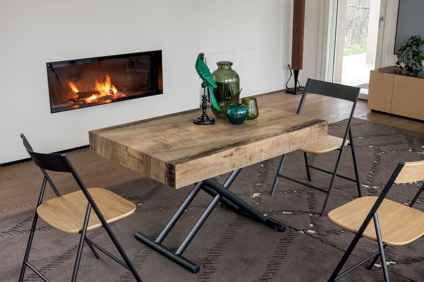 Altacom lift top table raised to dining height with chairs in modern living room
