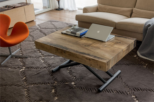 Altacom coffee table used as work surface with laptop in living room