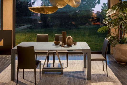 Altacom Combi fully extended table used as dining table with chairs in contemporary interior
