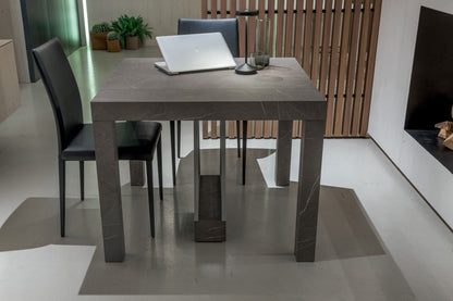 Altacom Combi table used as compact workspace and dining table with laptop and decor