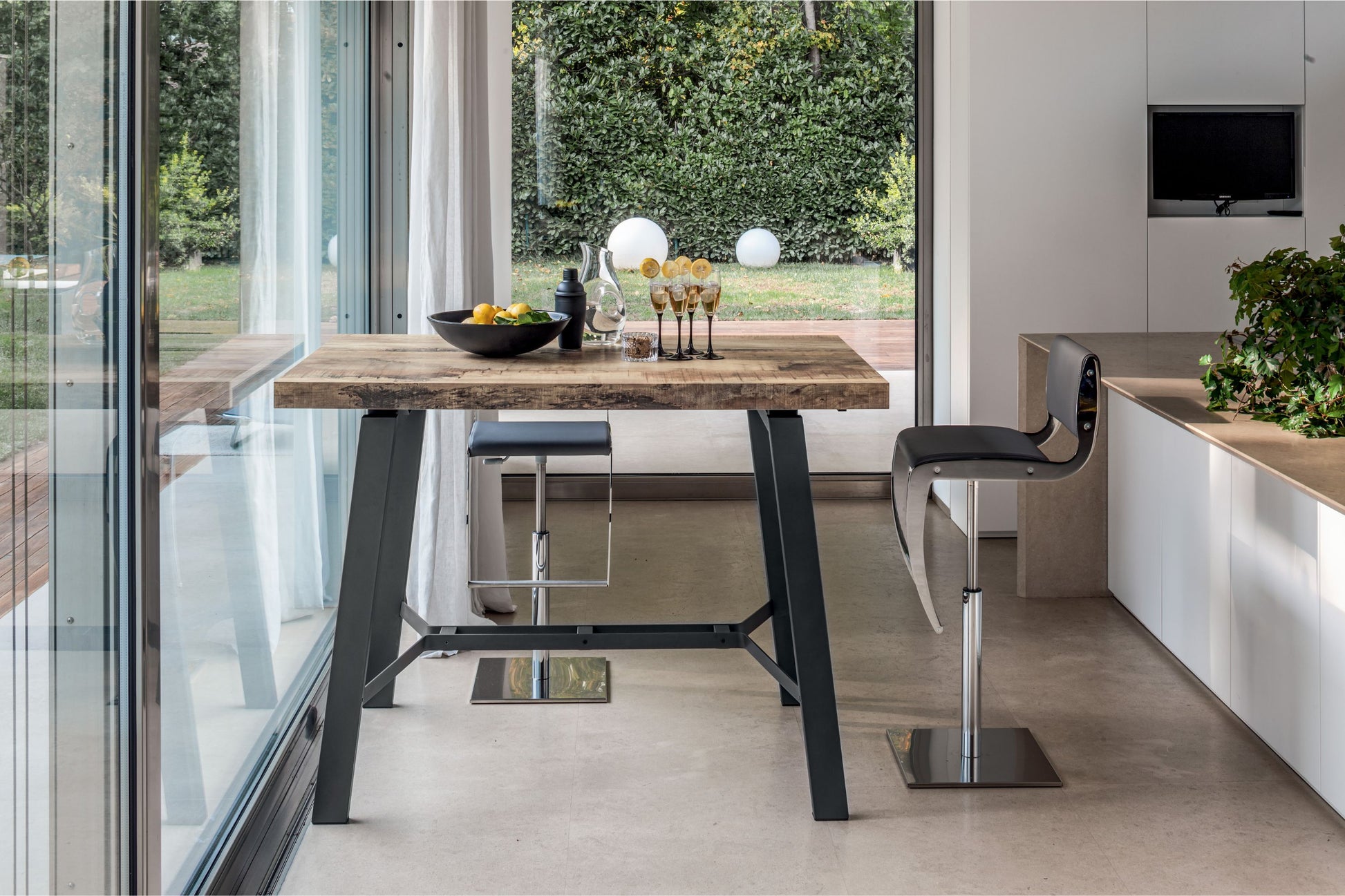 Altacom compact console table in closed position with wood top in modern interior