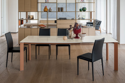 Altacom extendable ceramic dining table in beige with modern interior setting