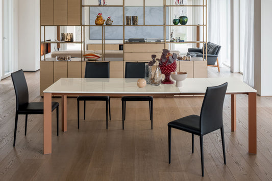 Altacom extendable ceramic dining table in beige with modern interior setting