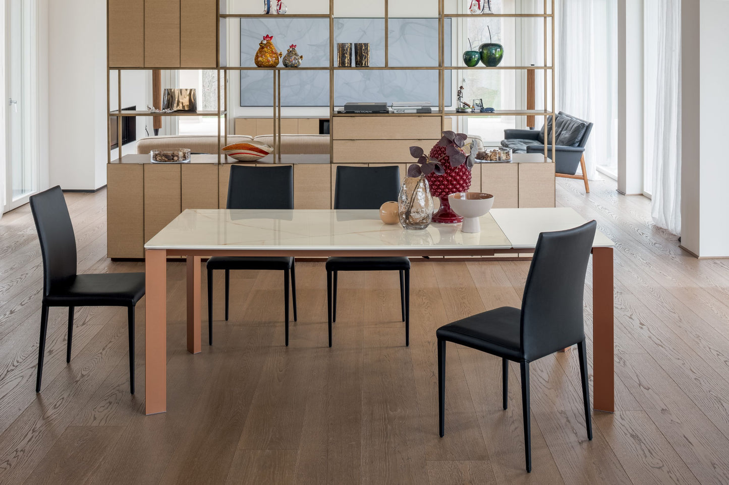 Altacom extendable dining table with ceramic top and metal frame in modern home