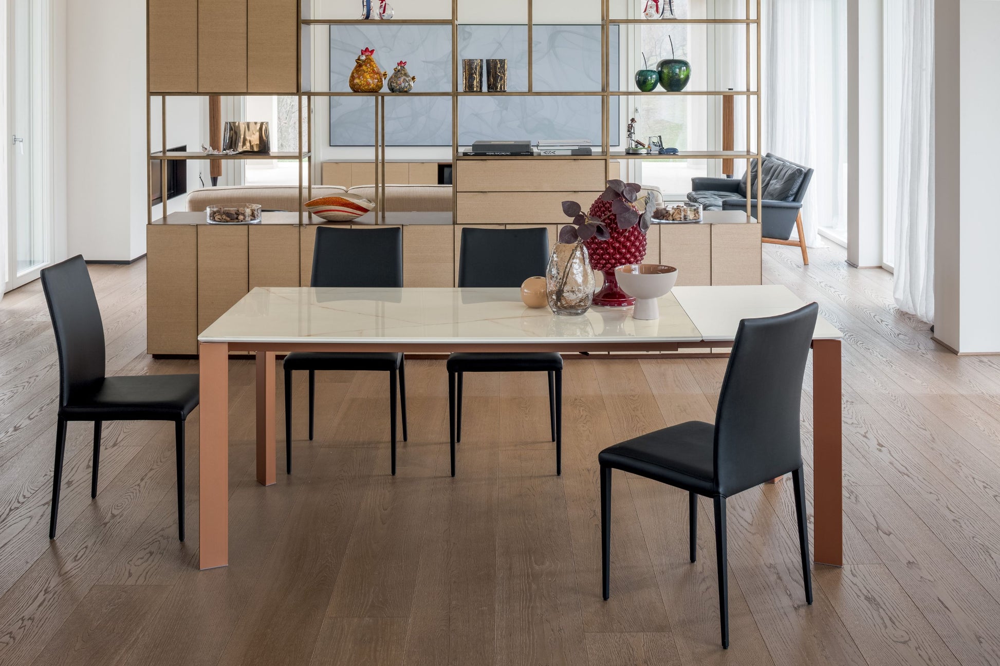 Altacom extendable dining table with ceramic top and metal frame in modern home