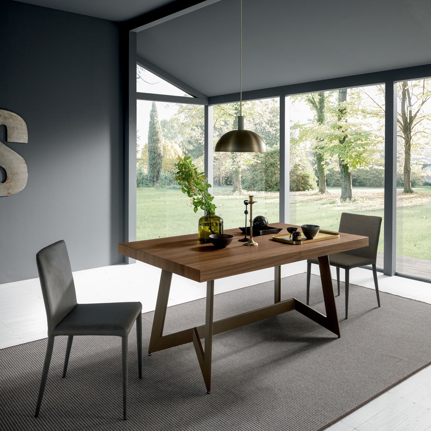 Altacom extendable dining table in modern living space with large windows and natural light