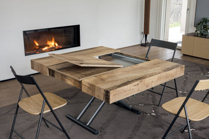 Altacom extendable table mechanism showing internal extension system and folding panels