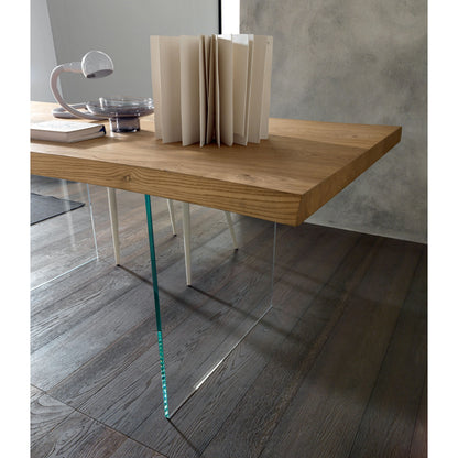 Close-up of Altacom oak table with transparent glass base and clean modern lines