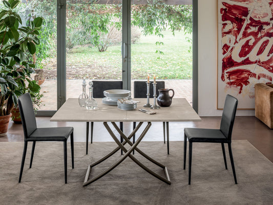Altacom Sakura transformable table extended to dining position with ceramic top and seating