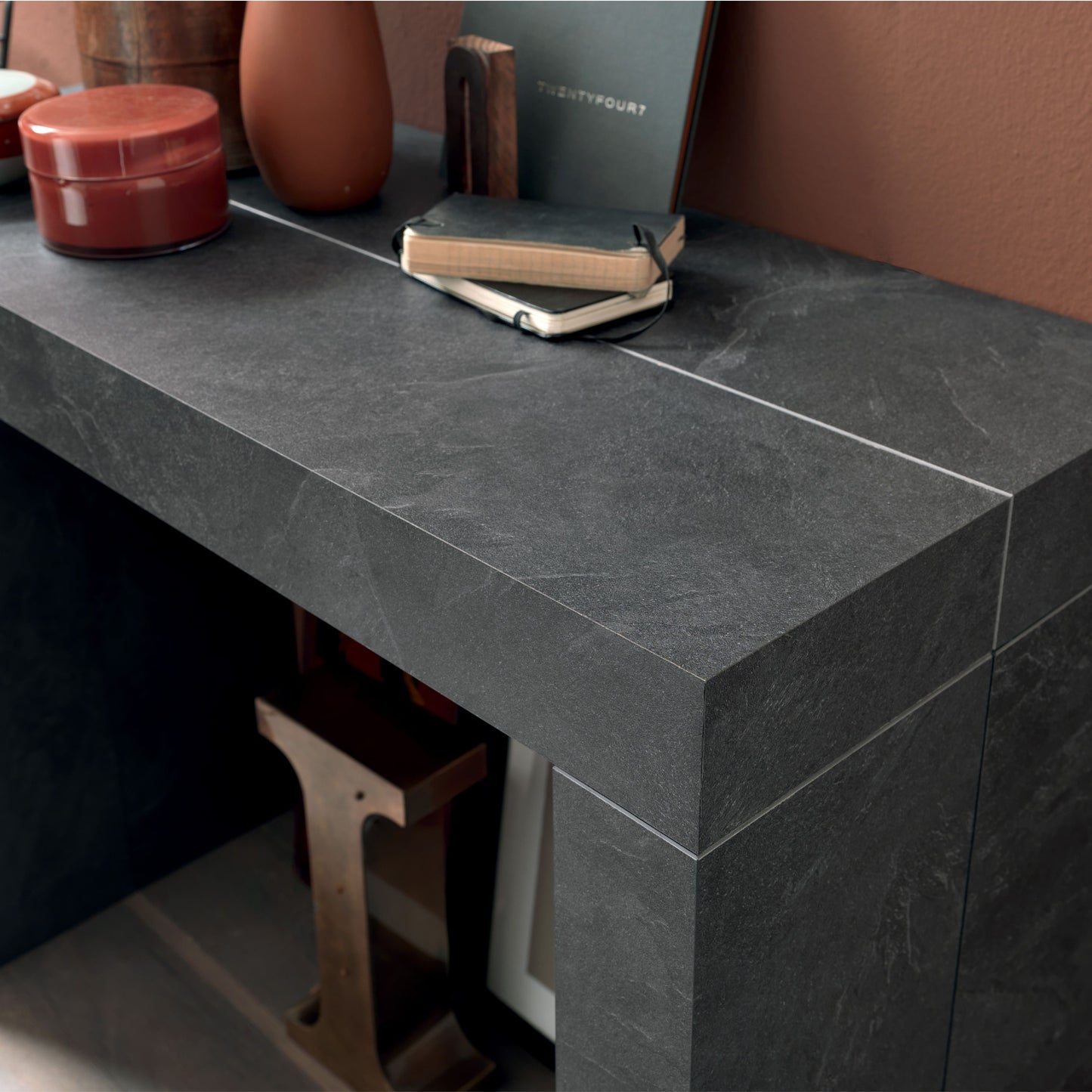Altacom square extendable table detail showing grey ceramic marble effect surface