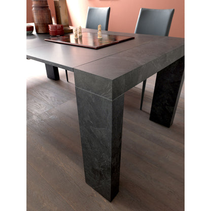 Altacom square table corner detail with thick ceramic top and structured legs