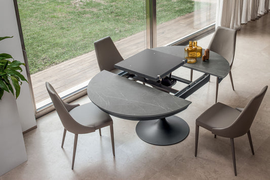Underneath view of pedestal table extension system and structure