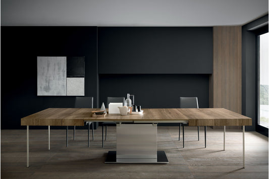 Altacom Tower Maxi extendable table showing opening mechanism and internal extension system