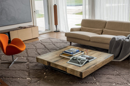 Altacom transformable coffee table in low position in living room with sofa and decor