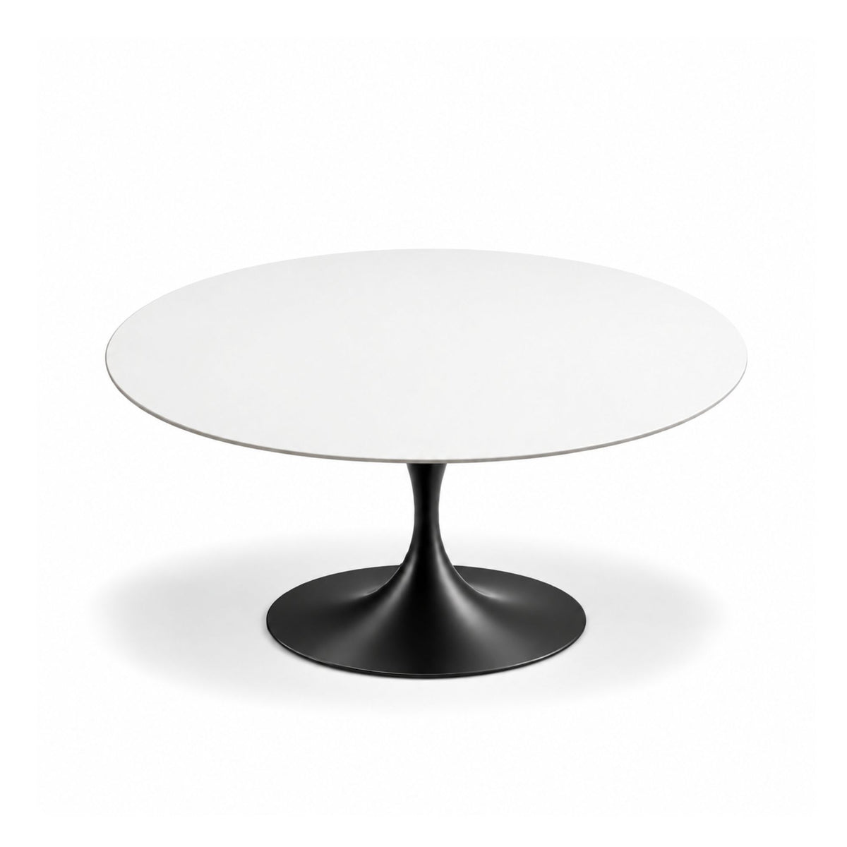 Arctic Noir Tulip coffee table featuring a smooth pure white stone tabletop with a glossy black tulip pedestal base, offering a striking minimalist design for luxury modern, contemporary, Scandinavian, and mid-century living room interiors.