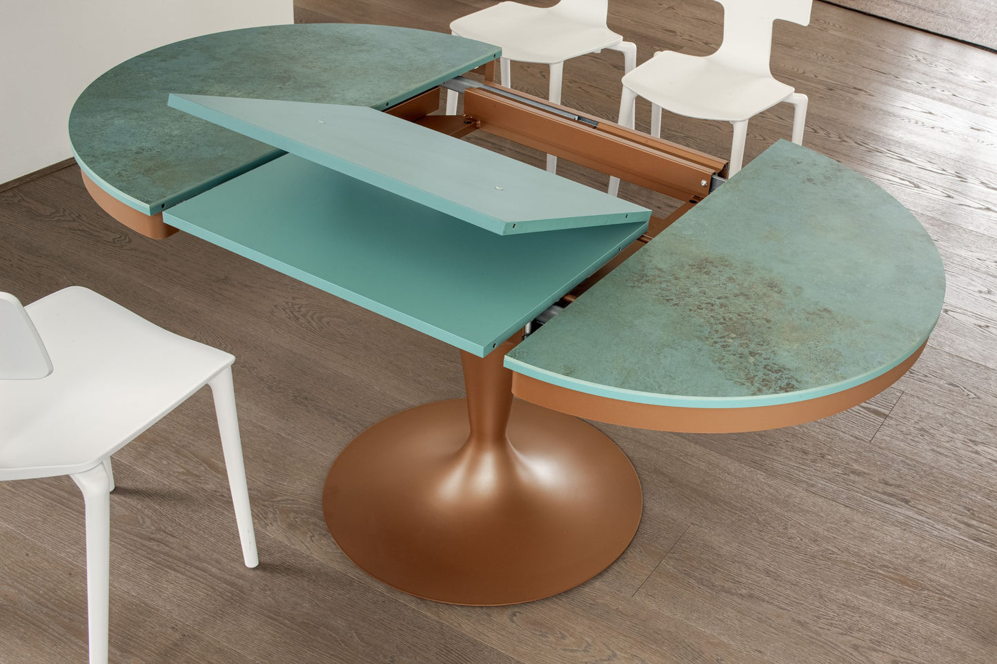 pedestal table extension mechanism showing internal leaf system