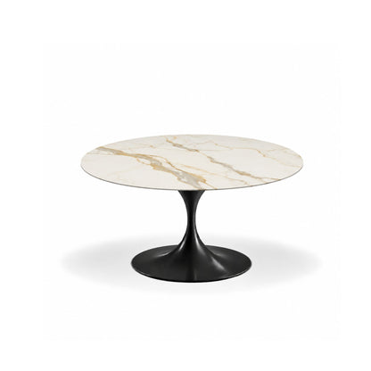 Aurum Calacatta Tulip coffee table featuring a polished Calacatta Gold marble tabletop with elegant gold and grey veining and a glossy black tulip pedestal base, perfect for luxury modern, contemporary, and mid-century living room interiors.