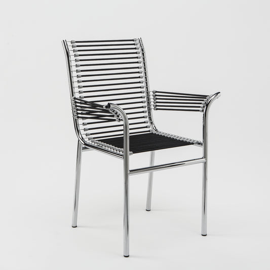 Belotti-inspired Spaghetti armchair with a polished chrome tubular steel frame, black PVC cord seat and backrest, combining iconic Italian design with lightweight comfort for contemporary dining and hospitality interiors.