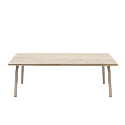 Front view of the S•CAB Brezza outdoor coffee table with a textured sand-coloured tabletop and rounded legs.