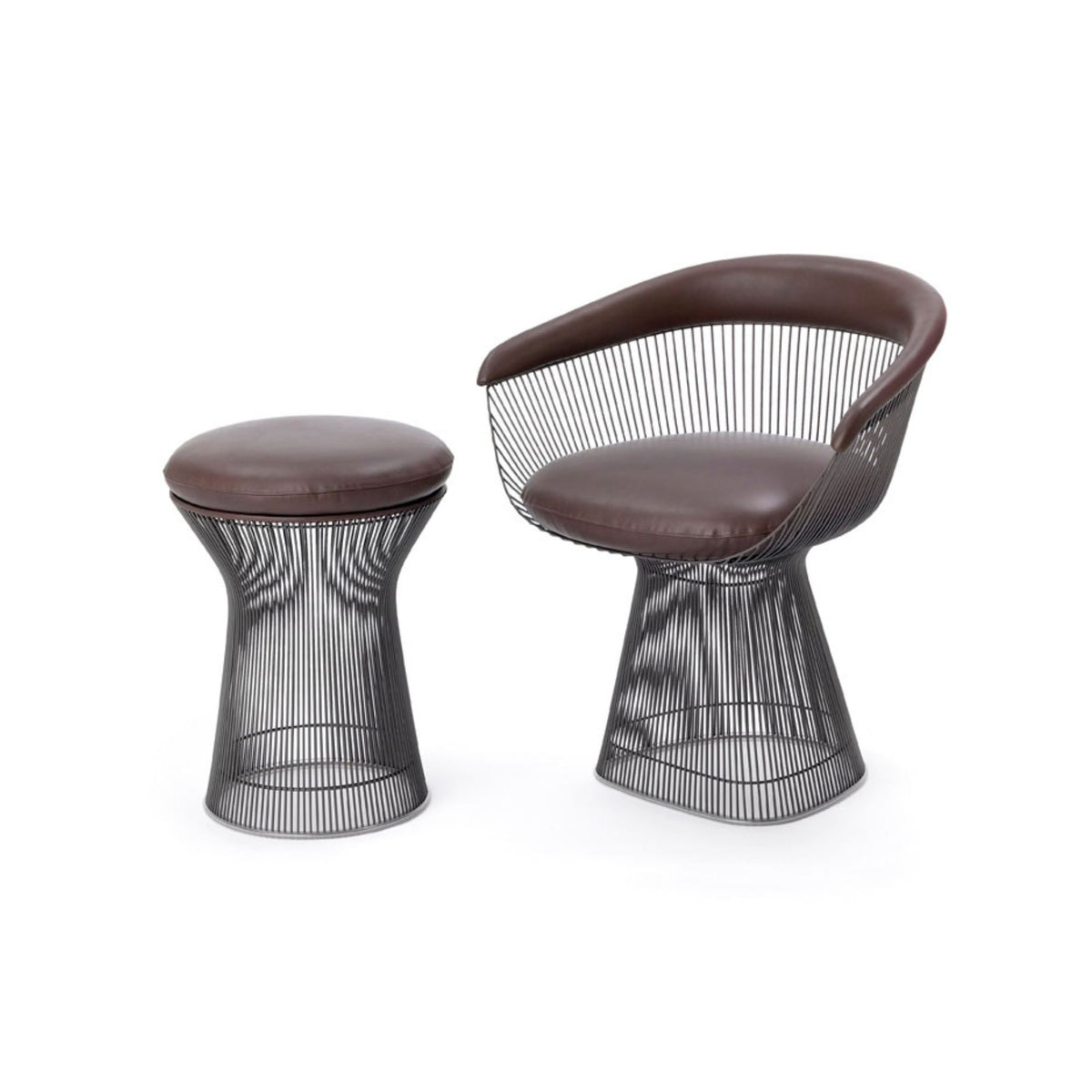 Brown leather Platner lounge chair with a sculptural wire pedestal base and matching upholstered Platner stool, featuring dark metallic steel rod frames in a timeless mid-century modern design.