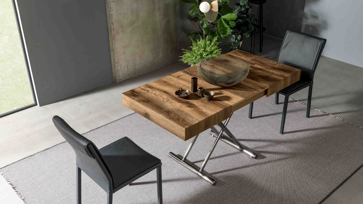 Calypso extendable dining table by Altacom with old oak wood top and polished chrome metal base fully extended