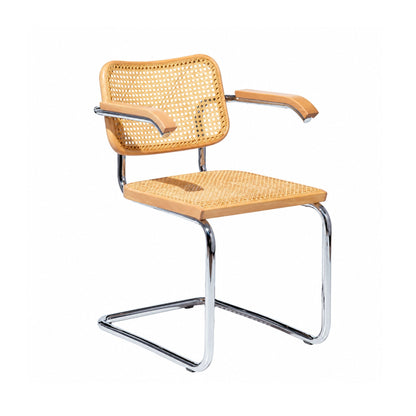 Marcel Breuer Cesca cane armchair with natural woven cane seat and back, solid wood armrests, and polished chrome cantilever frame on a white background.