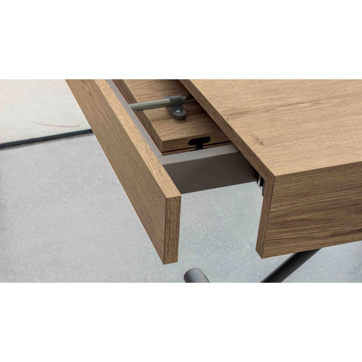 Compact convertible table by Altacom close-up of extension leaf mechanism showing hinge system and internal structure
