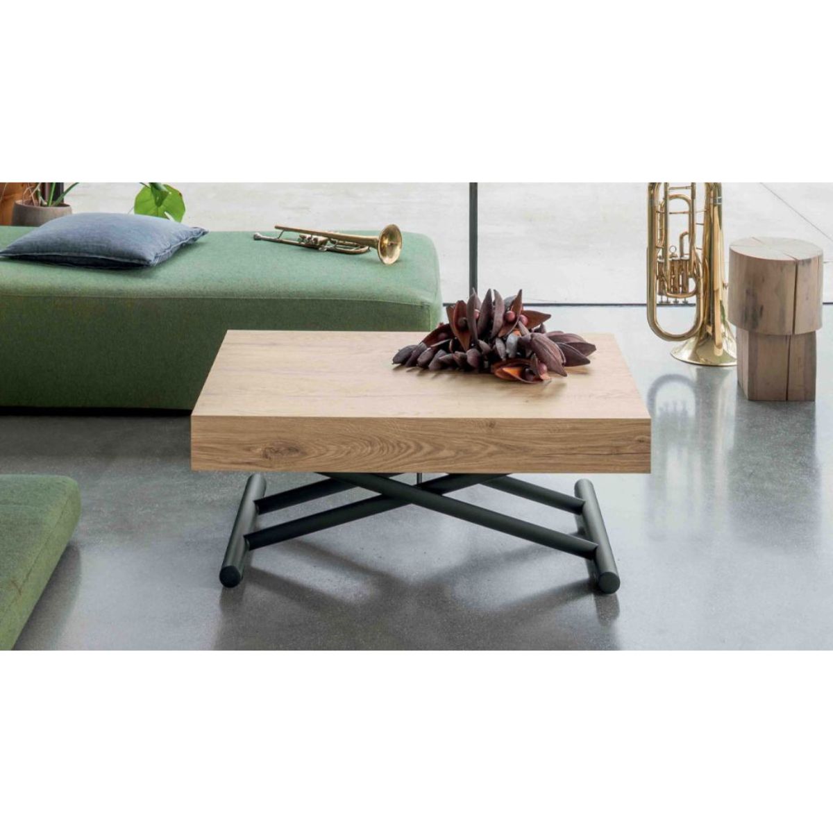 Compact convertible table by Altacom in lowest coffee table position showing small footprint and central lifting mechanism