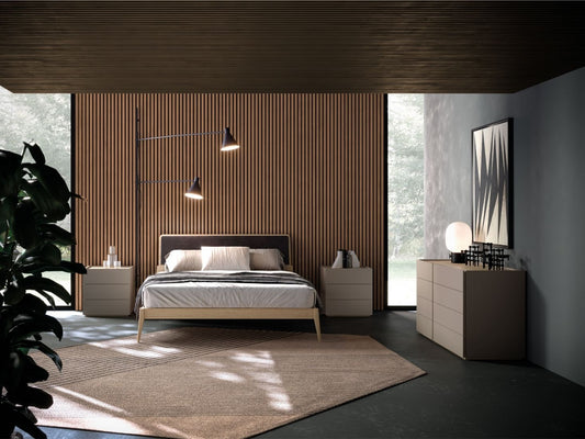 Modern bedroom with wooden bed, side tables, and dresser.