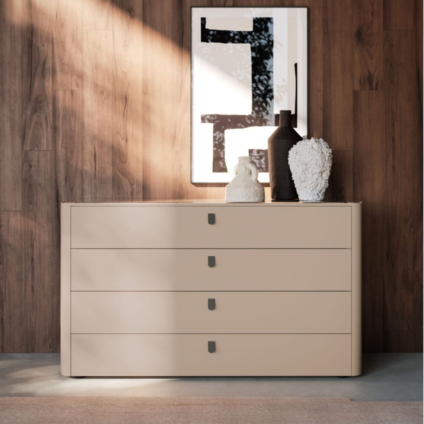 Beige dresser with decorative items against a wooden wall