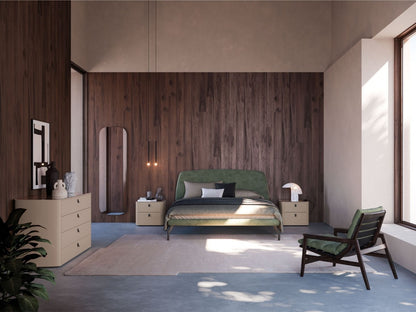 Modern bedroom with wooden wall, bed, and chair.