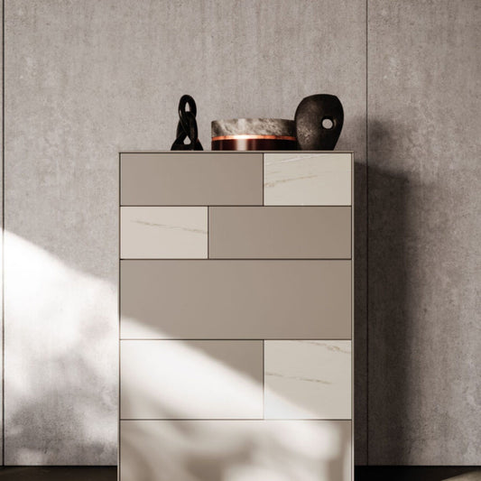 Modern cabinet with decorative items against a textured wall